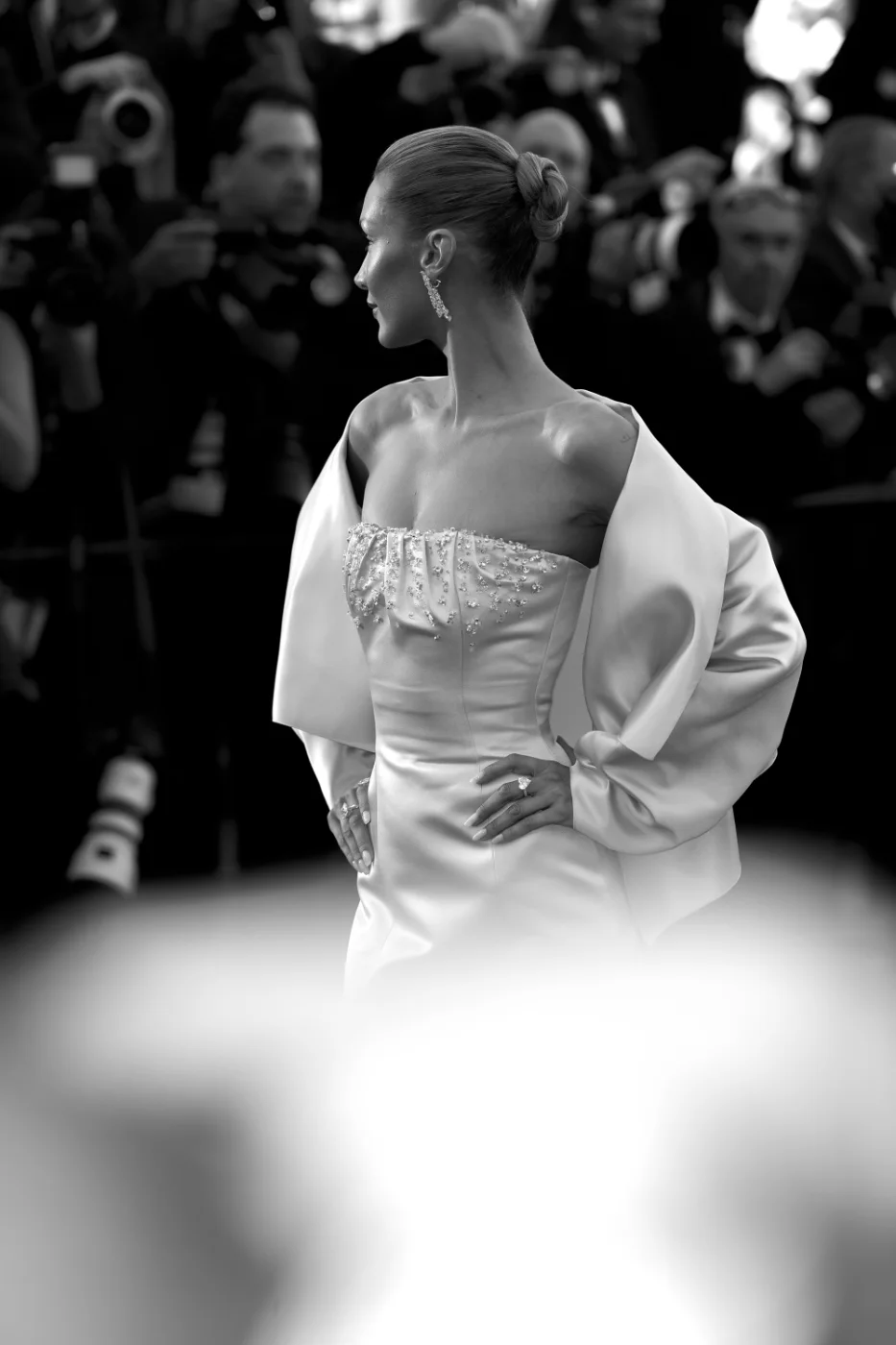Bella Hadid in Prada satin gown, back view with draped cape, Cannes Film Festival 2026 · Ph. Barbara Pigazzi