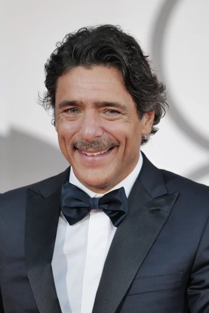 Adriano Giannini bright smile portrait in bow tie, Venice Film Festival 2026 – Ph. Barbara Pigazzi, Studio Animica