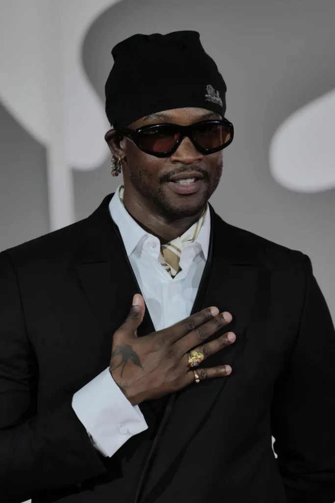 Akinola Davies Jr. close-up portrait with hand on chest, Venice Film Festival 2026 – Ph. Barbara Pigazzi, Studio Animica