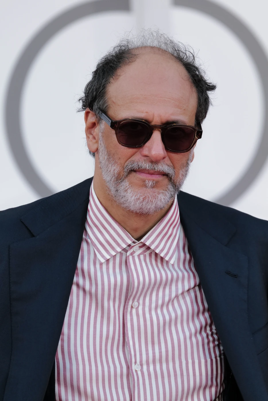 Luca Guadagnino close-up portrait, Venice Film Festival 2026 – Ph. Barbara Pigazzi, Studio Animica