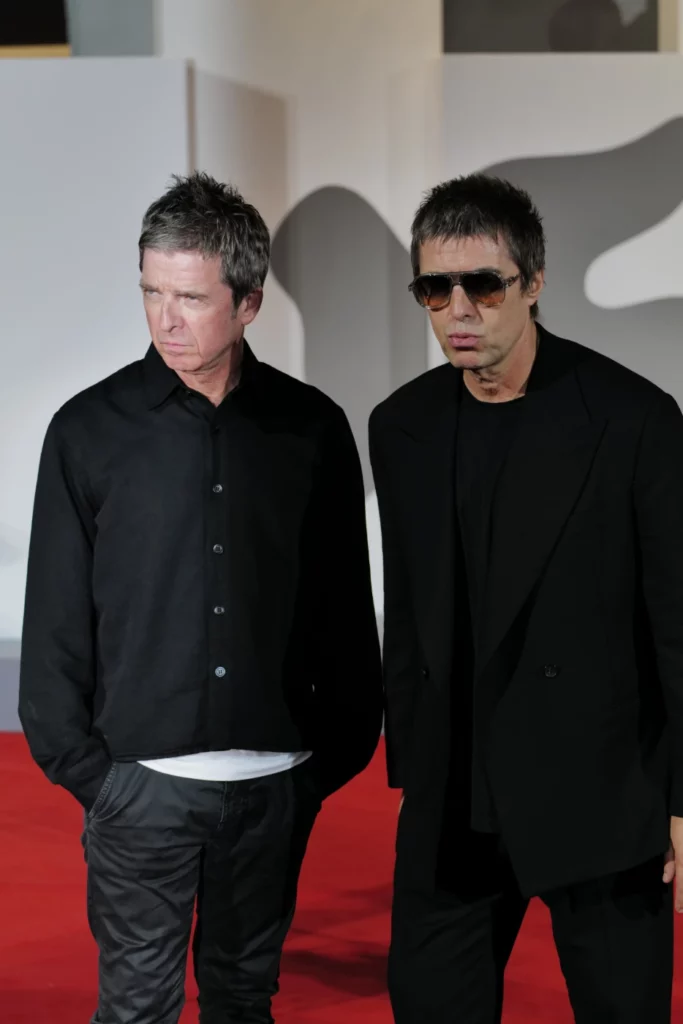 Noel and Liam Gallagher of Oasis, close-up with sunglasses, Venice Film Festival 2026 – Ph. Barbara Pigazzi, Studio Animica