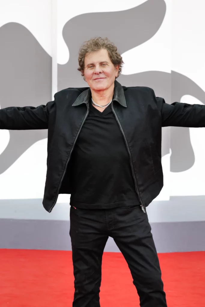 Renzo Rosso, full body with arms open, Venice Film Festival 2026 – Ph. Barbara Pigazzi, Studio Animica